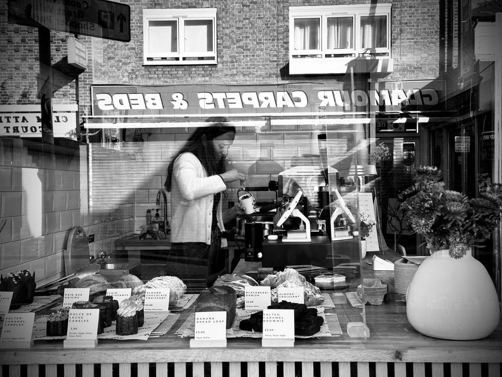 Behind the counter at Lytte Coffee — making coffee on the espresso machine